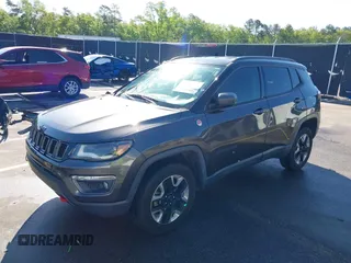 2018 Jeep Compass Trailhawk with VIN 3C4NJDDB3JT231923, listed as a IAAI auction lot 41929198 with 129,001 mi miles and . Bid and sale history available at carsss.com. Image 2.