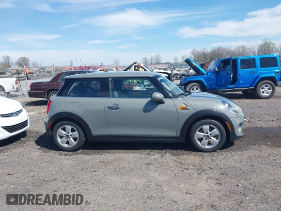 2019 MINI Hardtop Cooper with VIN WMWXP5C55K2H29830, listed as a IAAI auction lot 41808669 with 60,588 mi miles and . Bid and sale history available at DreamBid. Image 13.