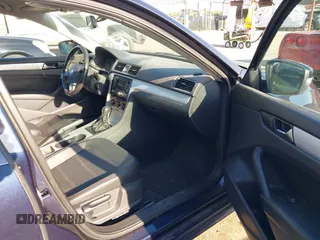 2013 Volkswagen Passat SE z VIN 1VWBP7A36DC130257, wystawiony jako IAAI lot #41987145 z przebiegiem 148 881 mil mil oraz . Historia ofert i sprzedaży dostępna na DreamBid. Obrazek 5.