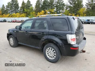 2009 Mercury Mariner Premier with VIN 4M2CU97G39KJ24297, listed as a Copart auction lot 77472674 with 153,316 mi miles and Salvage Title. Bid and sale history available at carsss.com. Image 2.