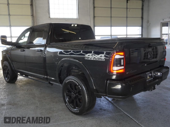 2021 Ram 2500 Laramie with VIN 3C6UR5FL9MG531373, listed as a Copart auction lot 58844015 with 96,144 mi miles and Salvage title. Bid and sale history available at DreamBid. Image 4.