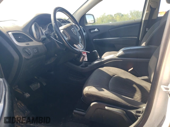 2015 Dodge Journey American Value with VIN 3C4PDCAB4FT531380, listed as a Copart auction lot 53103135 with 164,802 mi miles and Salvage Title. Bid and sale history available at DreamBid. Image 7.