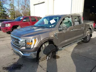 2021 Ford F-150 XL with VIN 1FTFW1E88MKE24484, listed as a IAAI auction lot 41655048 with 60,057 mi miles. Bid and sale history available at carsss.com. Image 2.