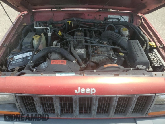 1998 Jeep Cherokee Sport with VIN 1J4FJ68S2WL285432, listed as a Copart auction lot 57183145 with 284,162 mi miles and Clean title. Bid and sale history available at DreamBid. Image 12.