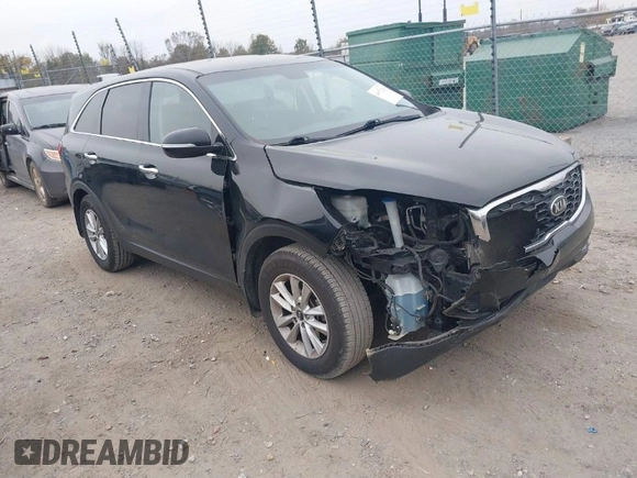 2019 Kia Sorento LX with VIN 5XYPG4A34KG579484, listed as a IAAI auction lot 40971250 with 142,327 mi miles. Bid and sale history available at carsss.com. Image 1.