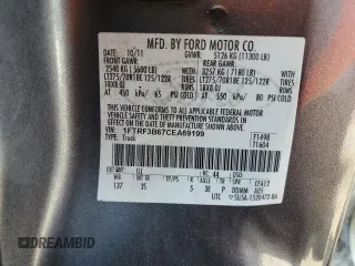 2012 Ford F-350 XL z VIN 1FTRF3B67CEA69199, wystawiony jako Copart lot #59471875 z przebiegiem 117 171 mil mil oraz Czysty tytuł • Clean title. Historia ofert i sprzedaży dostępna na DreamBid. Obrazek 13.