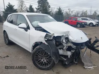 2018 Porsche Cayenne z VIN WP1AA2A21JKA00784, wystawiony jako IAAI lot #40813121 z przebiegiem 64 204 mil mil oraz . Historia ofert i sprzedaży dostępna na DreamBid. Obrazek 1.