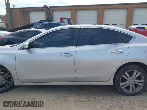 2013 Nissan Altima SL with VIN 1N4BL3AP5DC162522, listed as a IAAI auction lot 41684332 with 161,423 mi miles and . Bid and sale history available at DreamBid. Image 14.
