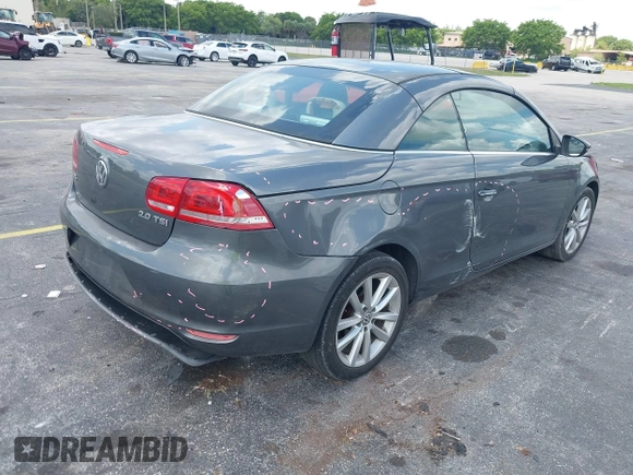2014 Volkswagen Eos Sport with VIN WVWBW8AH2EV000313, listed as a IAAI auction lot 42333112 with 106,125 mi miles and . Bid and sale history available at DreamBid. Image 4.