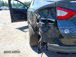 2016 Ford Fusion SE with VIN 3FA6P0T91GR263632, listed as a IAAI auction lot 42622712 with 184,000 mi miles and . Bid and sale history available at DreamBid. Image 18.
