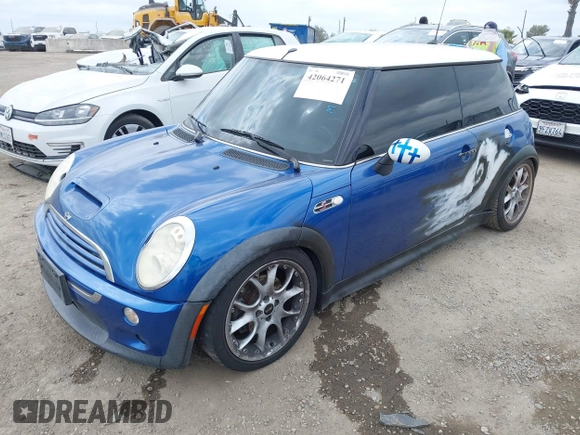 2006 MINI Hardtop S with VIN WMWRE33596TL21718, listed as a IAAI auction lot 42064271 with 177,664 mi miles and . Bid and sale history available at DreamBid. Image 2.