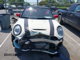 2021 MINI Convertible with VIN WMWWJ9C0XM3M07302, listed as a IAAI auction lot 42027854 with 30,921 mi miles and . Bid and sale history available at DreamBid. Image 12.