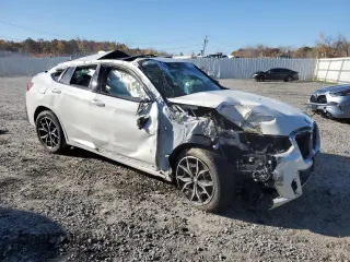 2023 BMW X4 M40i with VIN 5UX43DT05P9N61777, listed as a Copart auction lot 77600264 with 0 mi miles and Salvage Title. Bid and sale history available at carsss.com. Image 4.