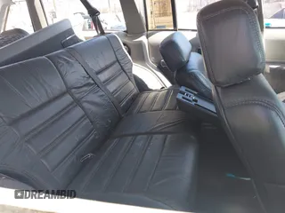 1991 Jeep Cherokee Country z VIN 1J4FJ78S7ML632675, wystawiony jako IAAI lot #42283175 z przebiegiem 116 062 mil mil oraz . Historia ofert i sprzedaży dostępna na DreamBid. Obrazek 8.