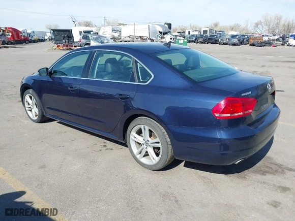 2014 Volkswagen Passat TDI SE w/Sunroof with VIN 1VWBN7A30EC055207, listed as a IAAI auction lot 41893637 with 133,074 mi miles. Bid and sale history available at carsss.com. Image 3.