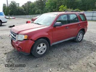 2009 Ford Escape XLS with VIN 1FMCU92759KC30565, listed as a Copart auction lot 52113675 with 138,292 mi miles and Salvage title. Bid and sale history available at DreamBid. Image 1.