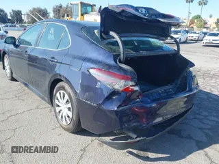 2022 Toyota Camry Hybrid LE with VIN 4T1C31AK7NU042879, listed as a IAAI auction lot 41729943 with 83,941 mi miles. Bid and sale history available at carsss.com. Image 3.