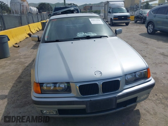 1997 BMW 3 Series 318iA with VIN WBACC0322VEK25478, listed as a IAAI auction lot 42033040 with 212,320 mi miles. Bid and sale history available at carsss.com. Image 12.