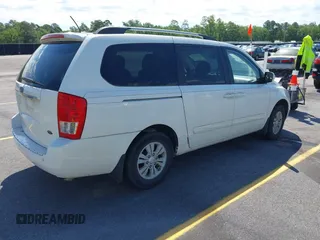 2012 Kia Sedona LX with VIN KNDMG4C71C6447550, listed as a IAAI auction lot 42190357 with 161,960 mi miles and . Bid and sale history available at carsss.com. Image 4.