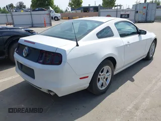 2014 Ford Mustang V6 with VIN 1ZVBP8AMXE5245688, listed as a IAAI auction lot 42074539 with 146,028 mi miles. Bid and sale history available at carsss.com. Image 4.