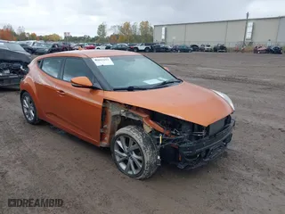 2016 Hyundai Veloster with VIN KMHTC6AD3GU270086, listed as a IAAI auction lot 40602691 with 78,744 mi miles. Bid and sale history available at carsss.com. Image 1.