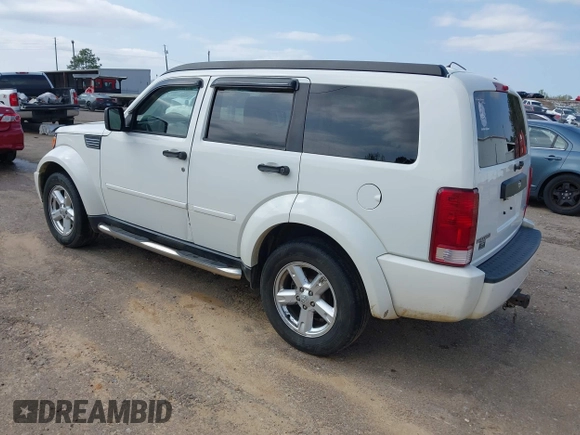 2008 Dodge Nitro SXT with VIN 1D8GU28K18W129119, listed as a IAAI auction lot 41899314 with 244,830 mi miles. Bid and sale history available at carsss.com. Image 3.