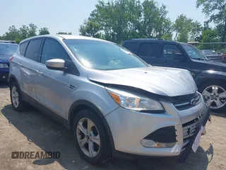 2014 Ford Escape SE with VIN 1FMCU9GX3EUC42964, listed as a IAAI auction lot 42484080 with 124,696 mi miles and . Bid and sale history available at DreamBid. Image 1.
