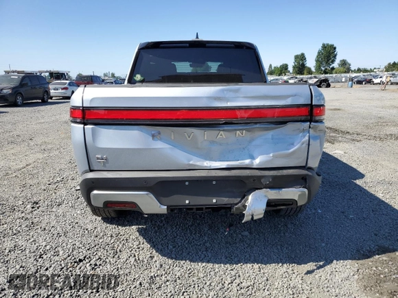 2023 Rivian R1T Adventure z VIN 7FCTGBAA0PN025046, wystawiony jako Copart lot #62502274 z przebiegiem 1385 mil mil oraz Szkody całkowita. Historia ofert i sprzedaży dostępna na DreamBid. Obrazek 6.