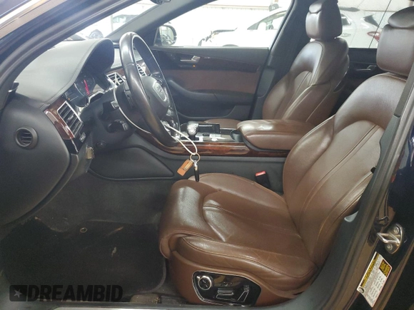 2011 Audi A8 z VIN WAURVAFD4BN005925, wystawiony jako Copart lot #56998325 z przebiegiem 147 449 mil mil oraz Tytuł czysty. Historia ofert i sprzedaży dostępna na DreamBid. Obrazek 7.