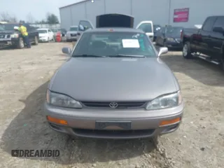 1996 Toyota Camry DX with VIN 4T1BG12K8TU762073, listed as a IAAI auction lot 41606136 with 254,939 mi miles. Bid and sale history available at carsss.com. Image 6.