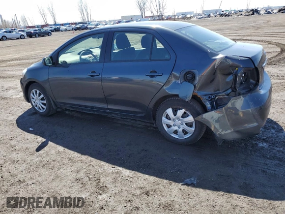 2012 Toyota Yaris with VIN JTDBT4K36CL028550, listed as a Copart auction lot 52071475 with 173,922 mi miles and Salvage Title. Bid and sale history available at DreamBid. Image 2.