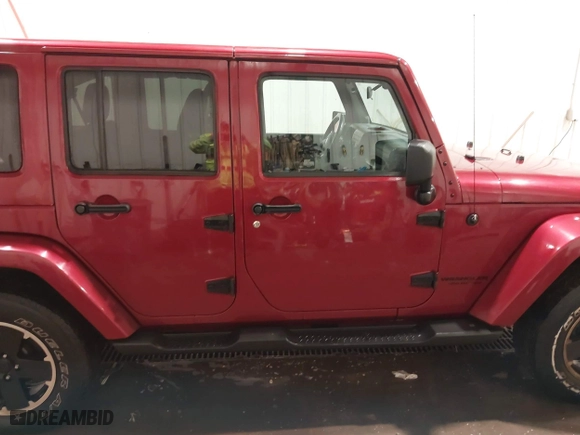 2012 Jeep Wrangler Unlimited Sahara with VIN 1C4BJWEG0CL256852, listed as a IAAI auction lot 41765640 with 171,408 mi miles. Bid and sale history available at carsss.com. Image 14.