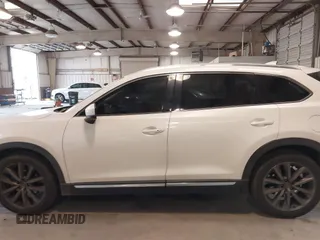 2017 Mazda CX-9 Grand Touring with VIN JM3TCADY5H0132572, listed as a IAAI auction lot 41421008 with 66,656 mi miles and . Bid and sale history available at DreamBid. Image 14.
