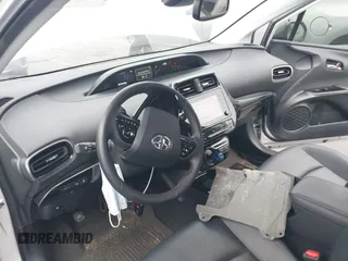 2022 Toyota Prius L Eco with VIN JTDKAMFU8N3164240, listed as a IAAI auction lot 41892462 with 35,980 mi miles and . Bid and sale history available at DreamBid. Image 5.
