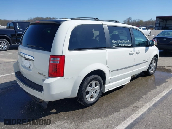 2010 Dodge Grand Caravan SXT with VIN 2D4RN5D14AR420265, listed as a IAAI auction lot 41970366 with 117,208 mi miles and . Bid and sale history available at DreamBid. Image 4.