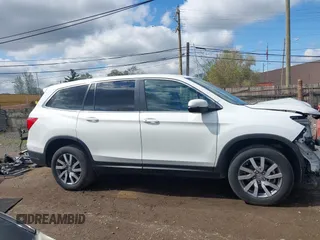 2021 Honda Pilot EX-L with VIN 5FNYF6H57MB054147, listed as a IAAI auction lot 42158910 with 37,811 mi miles and . Bid and sale history available at DreamBid. Image 14.