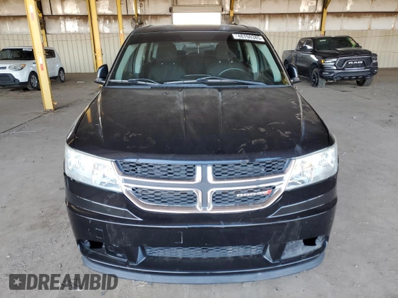 2013 Dodge Journey SE with VIN 3C4PDCAB4DT575943, listed as a Copart auction lot 48760385 with 127,081 mi miles and Salvage Title. Bid and sale history available at carsss.com. Image 5.