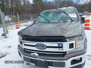 2018 Ford F-150 XL with VIN 1FTEW1EB6JFC63953, listed as a IAAI auction lot 41304091 with 74,636 mi miles. Bid and sale history available at carsss.com. Image 19.