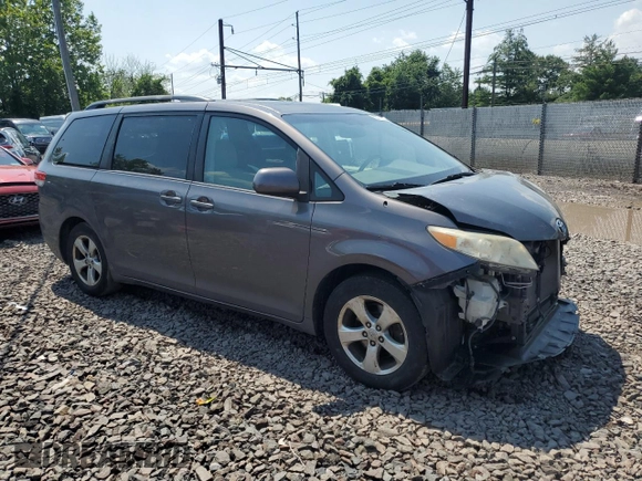 2012 Toyota Sienna XLE AAS with VIN 5TDYK3DC3CS237344, listed as a Copart auction lot 63271815 with 105,860 mi miles and Salvage title. Bid and sale history available at DreamBid. Image 4.