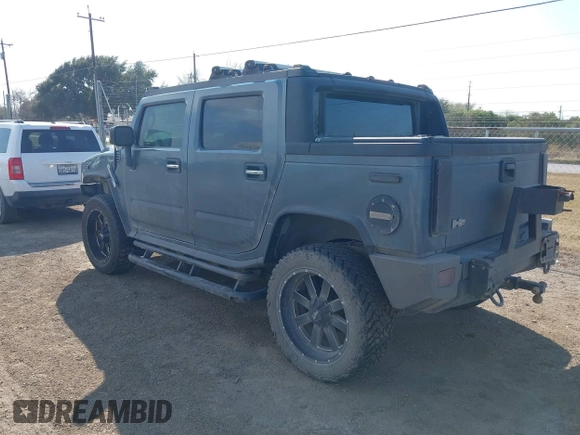 2006 Hummer H2 with VIN 5GRGN22U06H103326, listed as a IAAI auction lot 41474829 with 217,436 mi miles. Bid and sale history available at carsss.com. Image 3.