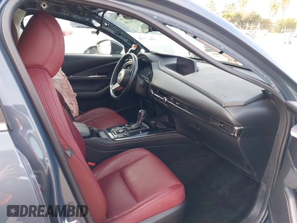 2023 Mazda CX-30 S Carbon Edition with VIN 3MVDMBCM7PM589019, listed as a IAAI auction lot 41251168 with 23,847 mi miles and . Bid and sale history available at DreamBid. Image 5.