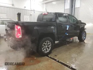 2021 GMC Canyon 4WD AT4 w/Cloth with VIN 1GTG6FEN0M1106579, listed as a Copart auction lot 81330184 with 29,630 mi miles and Salvage Title. Bid and sale history available at carsss.com. Image 3.