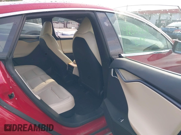 2020 Tesla Model S Long Range with VIN 5YJSA1E25LF396213, listed as a IAAI auction lot 42383231 with 73,125 mi miles and . Bid and sale history available at DreamBid. Image 8.