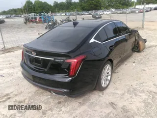 2020 Cadillac CT5 Luxury z VIN 1G6DM5RK4L0100133, wystawiony jako IAAI lot #42133272 z przebiegiem 84 036 mil mil oraz . Historia ofert i sprzedaży dostępna na DreamBid. Obrazek 4.