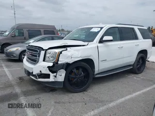 2017 GMC Yukon SLT with VIN 1GKS2BKC9HR125757, listed as a IAAI auction lot 42034182 with 72,333 mi miles. Bid and sale history available at carsss.com. Image 19.