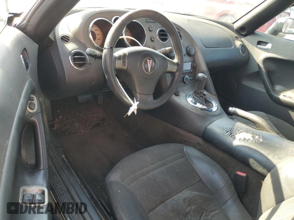 2007 Pontiac Solstice z VIN 1G2MB35B17Y105220, wystawiony jako Copart lot #52199785 z przebiegiem 348 414 mil mil oraz Czysty tytuł • Clean title. Historia ofert i sprzedaży dostępna na DreamBid. Obrazek 8.