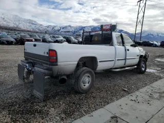1999 Dodge Ram 2500 with VIN 1B7KF2361XJ635946, listed as a Copart auction lot 87236594 with 234,005 mi miles and Salvage Title. Bid and sale history available at carsss.com. Image 3.
