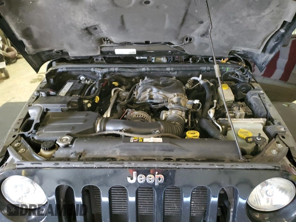 2015 Jeep Wrangler Unlimited Rubicon with VIN 1C4BJWFG3FL653961, listed as a Copart auction lot 47497135 with 97,707 mi miles and Clean title. Bid and sale history available at DreamBid. Image 12.