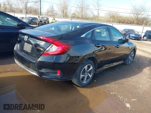 2020 Honda Civic LX with VIN 19XFC2F68LE029699, listed as a IAAI auction lot 41894102 with 113,900 mi miles and . Bid and sale history available at DreamBid. Image 4.