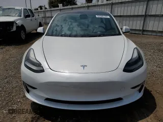 2023 Tesla Model 3 Performance with VIN 5YJ3E1EC5PF487845, listed as a Copart auction lot 62686164 with 4,938 mi miles and Salvage Title. Bid and sale history available at carsss.com. Image 5.